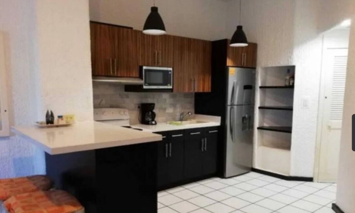 Cabo Bello Condo | 1 min walk to beach with King Bed located inCabo San Lucas