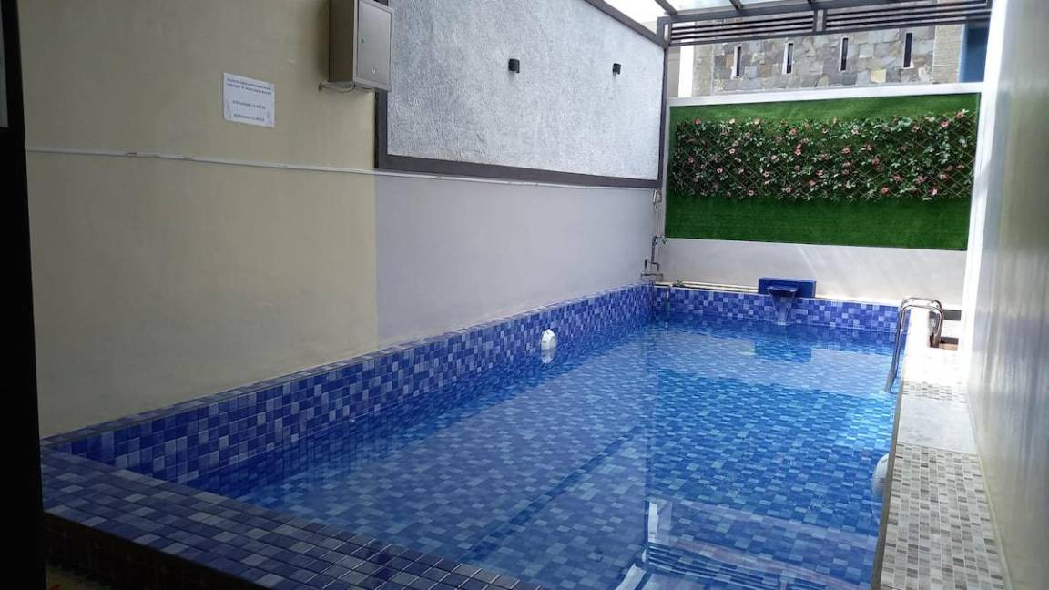 Dinoyo Villa | 121 m² Villa ∙ 4 bedrooms ∙ 12 guests