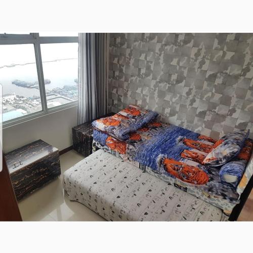 Pluit Apartment | 4 Bed Condo Sleeping by The Sea