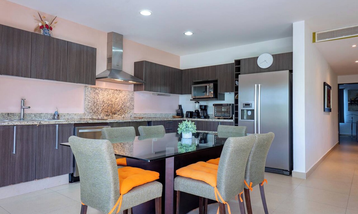 Playacar Fase II Condo | 4 Pools and Budget Penthouse in Vaiven. From BRIC Vacation Rentals