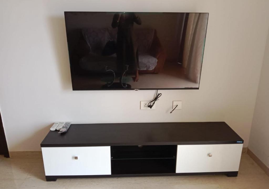 Kadadhe Apartment | AC 1bhk furnished flat towards highway view in Lodha Belmondo, Pune