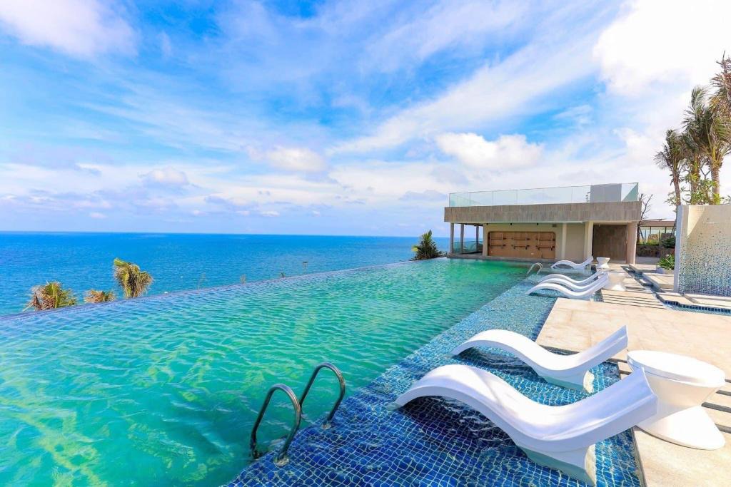 Suoi Nuoc Beach Apartment | Apec Mandala Mũi Né with Infinity Pool