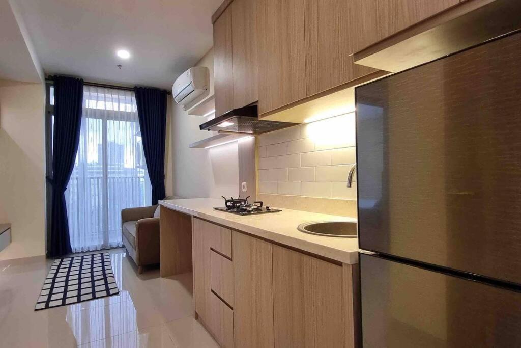 Ragunan Apartment | Apt Pejaten Park 1BR Khaki with SmartTv and Pool