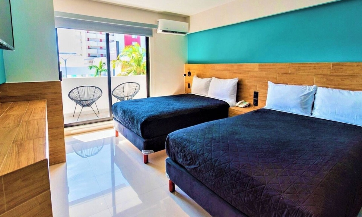 Zona Dorada Hotel | Beachside Comfort Near Camaron Beach with Terrace l 2 Comfortable Rooms