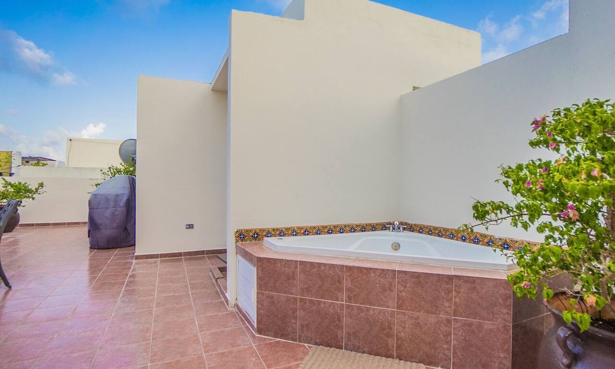 Gonzalo Guerrero Condo | Budget Penthouse. Walking Distance to Beach and Stores by BRIC Vacation Rentals