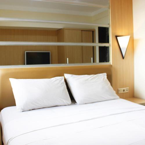 Braga Apartment | Classic 3BR At Braga City Walk Apartment By Travelio