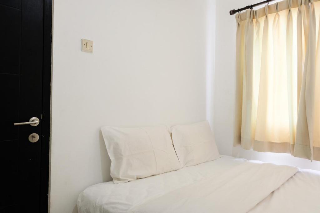 Binong Apartment | Comfortable 2BR Apartment at Paragon Village By Travelio