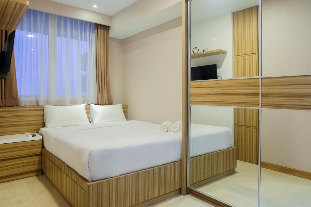 Bintaro Apartment | Comfy and Modern 1BR at Lexington Apartment By Travelio