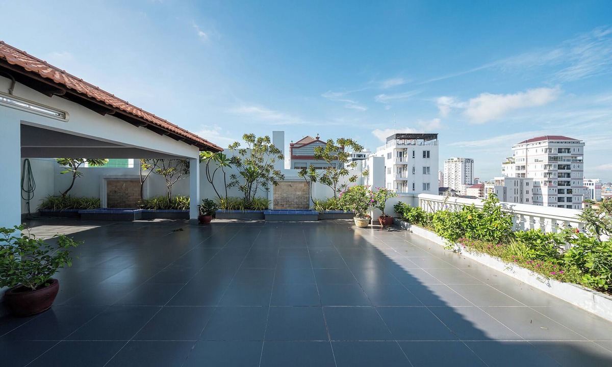 Chamkar Mon Condo | Cozy 1BR condo with hardwood floors and rooftop sunset garden in Phnom Penh