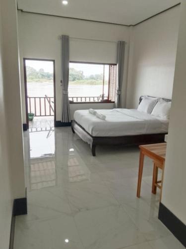 Don Det House | DODAND Studio & Sunset Riverside Guesthouse