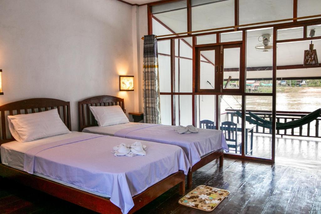 Don Khon House | Dokchampa Guesthouse