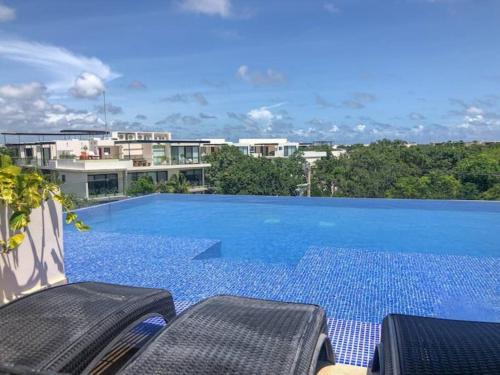 Tulum House | EXCLUSIVE BUILDING INFINITY POOL AND GYM RESTAURANTS AND BAR DISTRICT NEARBy
