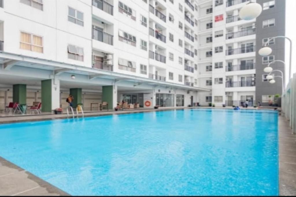 Cibaduyut Hotel | EXPRESS O 91863 Mekarwangi M-square Apartment By Santosa Property