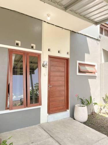 Banjarasri Villa | Homestay Kamar Tamu Sitimulyo