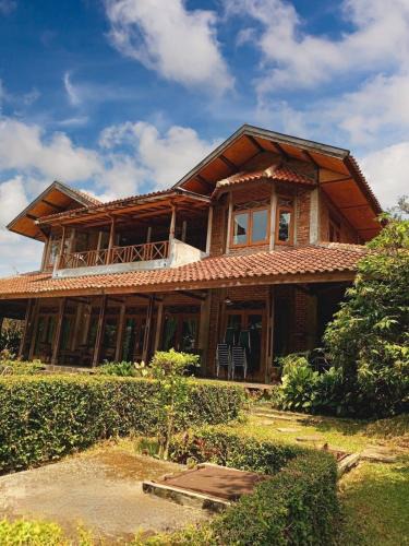 Cigombong Villa | Large Bogor Villa with Pool, BBQ Grill & Fishing Spot by 2ndHome