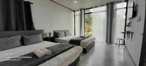Chom Thong House | lnthanon Laoju เล่าจู