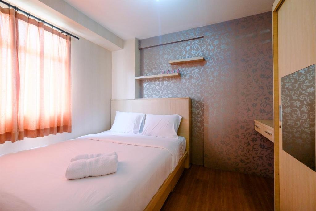 Pancoran Apartment | Minimalist 2BR at Kalibata City Apartment By Travelio