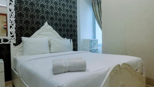 Menteng Apartment | Pool View 2BR Apartment at Capitol Park Residence By Travelio