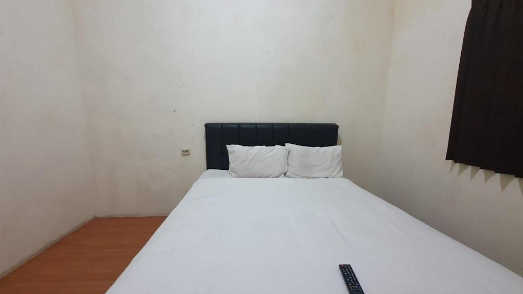 Jember Hotel | RedDoorz Syariah At Demasto Homestay Jember