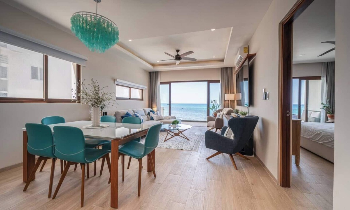 Centro - Supmza 001 Apartment | Wake up to turquoise waters at Isla Bliss 🌴 — a luxury 3-bedroom oceanfront condo just minutes from Isla Mujeres’ best dining and beaches. Enjoy a 90" Smart TV, stunning views, fast WiFi, and easy self-check-in for the perfect island escape. 🌊✨