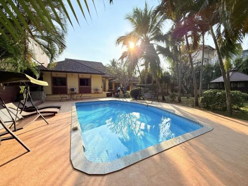 Wua Lai Villa | Yellow House Garden Pool Villa