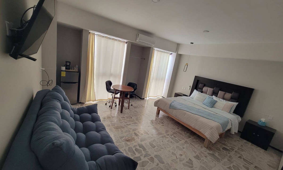 Centro Apartment | Your perfect stay awaits you in the heart of Uruapan! Olivier Suites & Lofts