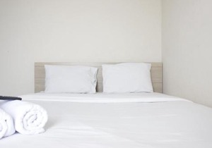 Best Location 2BR Tamansari La Grande Apartment By Travelio