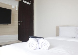 Best Location 2BR Tamansari La Grande Apartment By Travelio