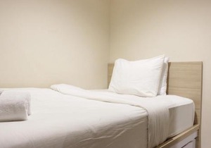 Best Location 2BR Tamansari La Grande Apartment By Travelio