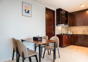 Comfortable Deluxe 2BR at The Empyreal Condominium Epicentrum Apartment By Travelio