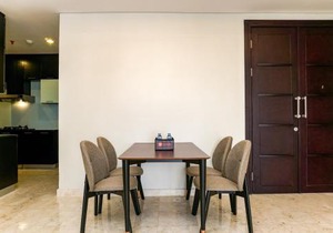 Cozy 2BR @ The Masterpiece Condominium Epicentrum Apartment By Travelio