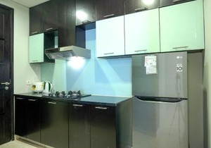 Cozy 2BR @ The Masterpiece Condominium Epicentrum Apartment By Travelio