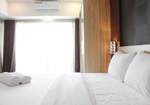 Deluxe Studio Room @ Tamansari La Grande Apartment By Travelio