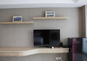 Deluxe Studio Room @ Tamansari La Grande Apartment By Travelio