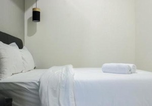 Direct Access to Pool 2BR Apartment at Parahyangan Residence By Travelio