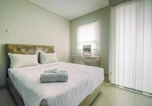 Elegant with Modern Design 1BR Apartment at Atlanta Residences By Travelio