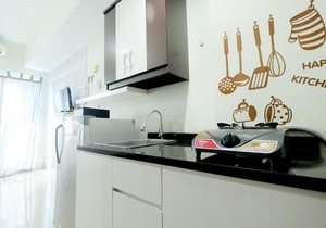Homey Studio @ Grand Dhika City Apartment By Travelio