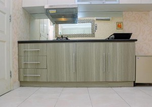 Minimalist and Cozy 1BR Apartment at The Boulevard By Travelio