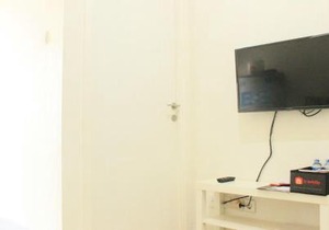 Modest 1BR Apartment at Parahyangan Residence By Travelio