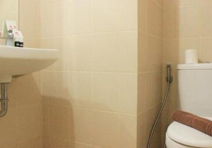 Modest 1BR Apartment at Parahyangan Residence By Travelio