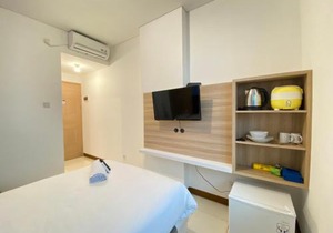 Smart Studio Room Semi Apartment at The Lodge Paskal near BINUS University By Travelio