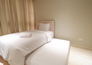 Spacious and Modern 2BR The Residence Ciputra World 2 Apartment near to SCBD By Travelio