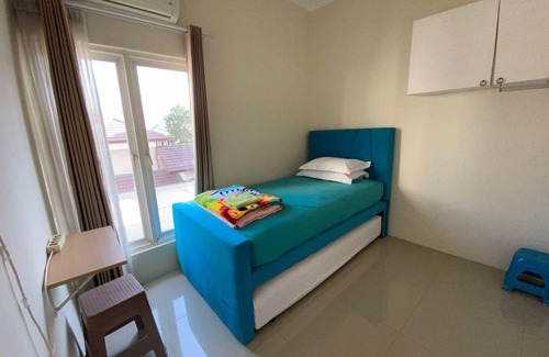 Sidoarjo House | 144 m² House ∙ 3 bedrooms ∙ 6 guests