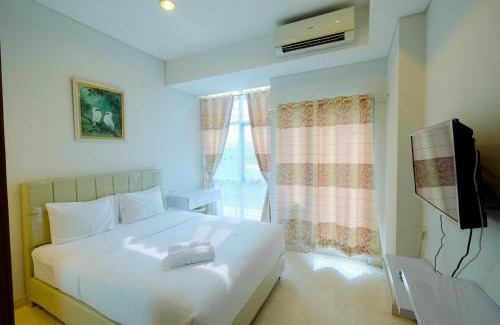 Menteng Apartment | Best Emerald Studio Room Apartment at Capitol Park Residence By Travelio
