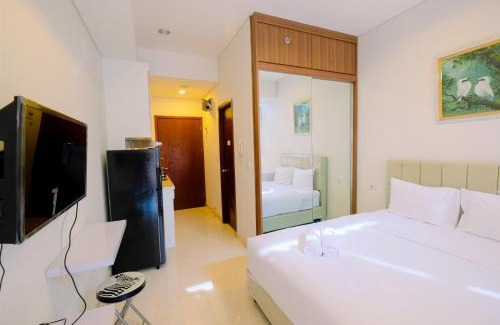 Menteng Apartment | Best Emerald Studio Room Apartment at Capitol Park Residence By Travelio