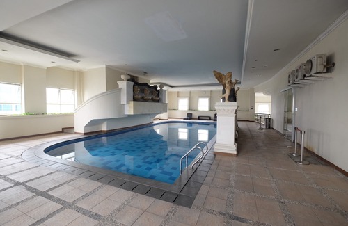 Kampung Bali Hotel | Minimalist and Cozy 1Br Apartment at The Boulevard