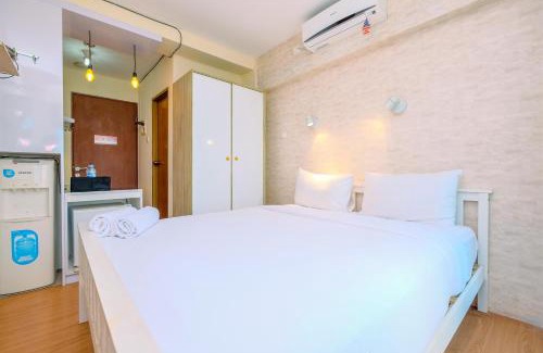 Kayu Putih Apartment | Minimalist Studio with Great City View at Tifolia Apartment By Travelio