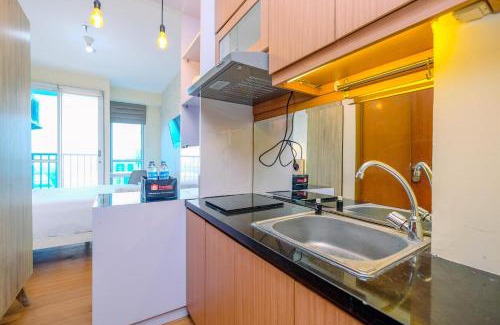 Kayu Putih Apartment | Minimalist Studio with Great City View at Tifolia Apartment By Travelio