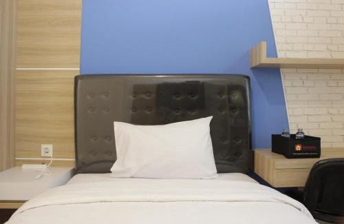 Ciroyom Apartment | Pleasant Studio Semi Apartment at The Lodge Paskal near BINUS University By Travelio