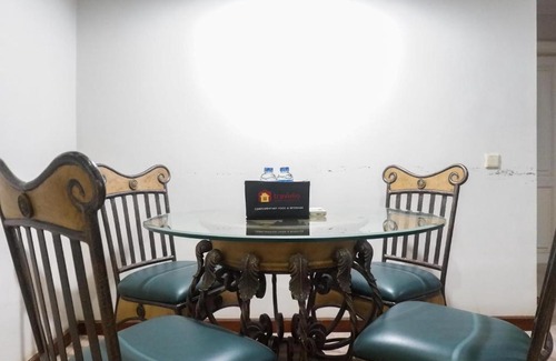 Suko Manunggal Apartment | Scenic 2BR Apartment at Taman Beverly By Travelio